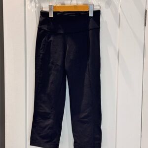 Lululemon Black Flared Capri Yoga pants - size 2 side slit